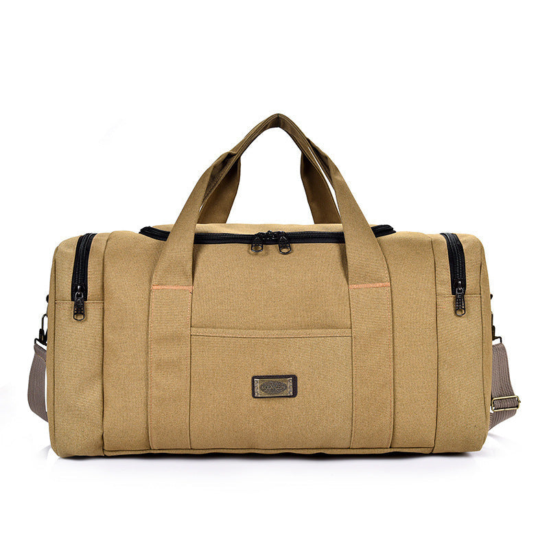 Large khaki canvas handbag with solid color design, featuring urban simplicity style and large capacity for business travel.