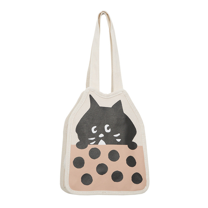Casual hand-carrying canvas bag with cute kitten illustration, vertical square shape.