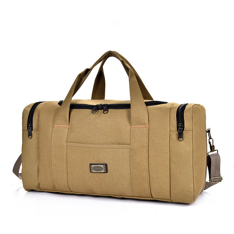 Large khaki canvas handbag with a minimalist design, ideal for long-distance business travel, featuring a 56-75L capacity.