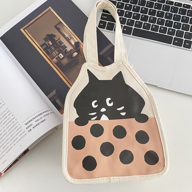 Canvas bag with cute kitten illustration, magnetic snap, vertical square shape.